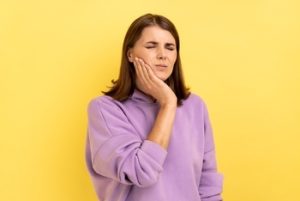 Dental,Problems,,Toothache.,Portrait,Of,Unhappy,Woman,Touching,Cheek,,Suffering